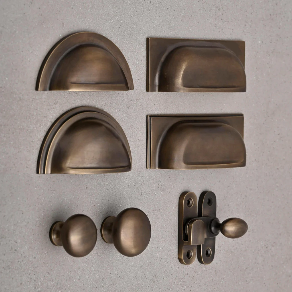 Intensify The General Look Of Cabinets By Installing Antique Brass Door Pulls